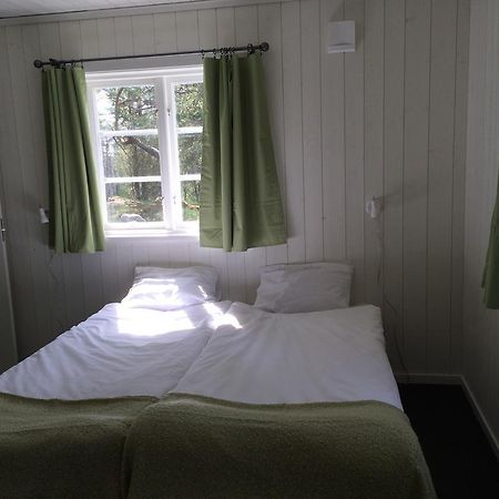 Oesjoenaes Hotel Tived Bagian luar foto