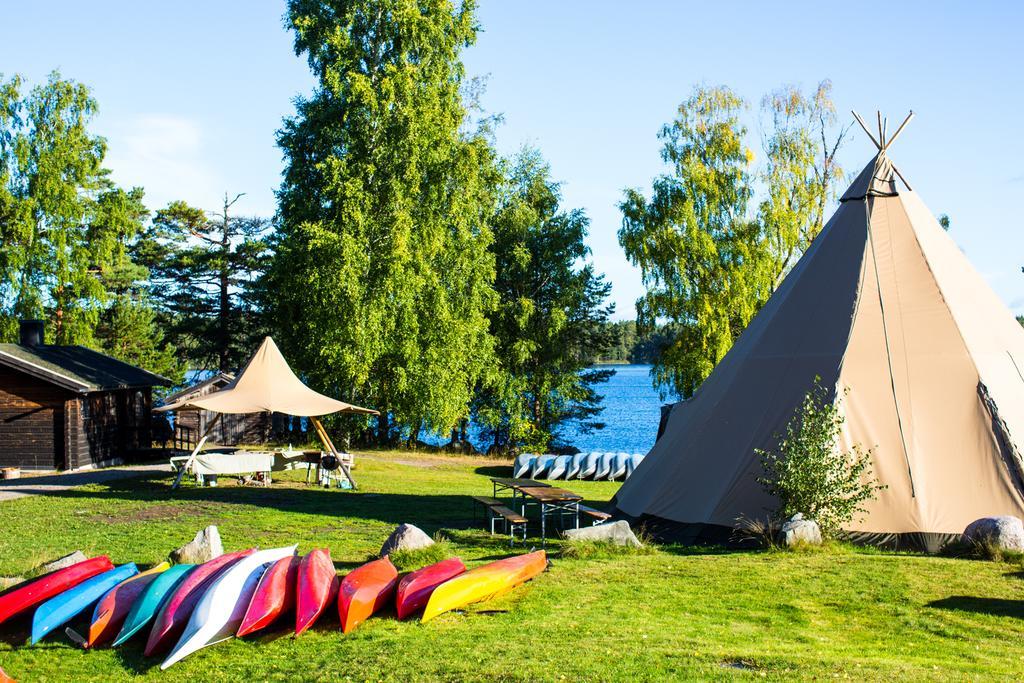 Oesjoenaes Hotel Tived Bagian luar foto